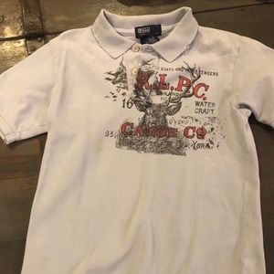 Boys size 7 Polo light blue w design EUC